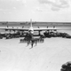 Personnel and equipment required to get and keep a B-36 Peacemaker airplane in the air.